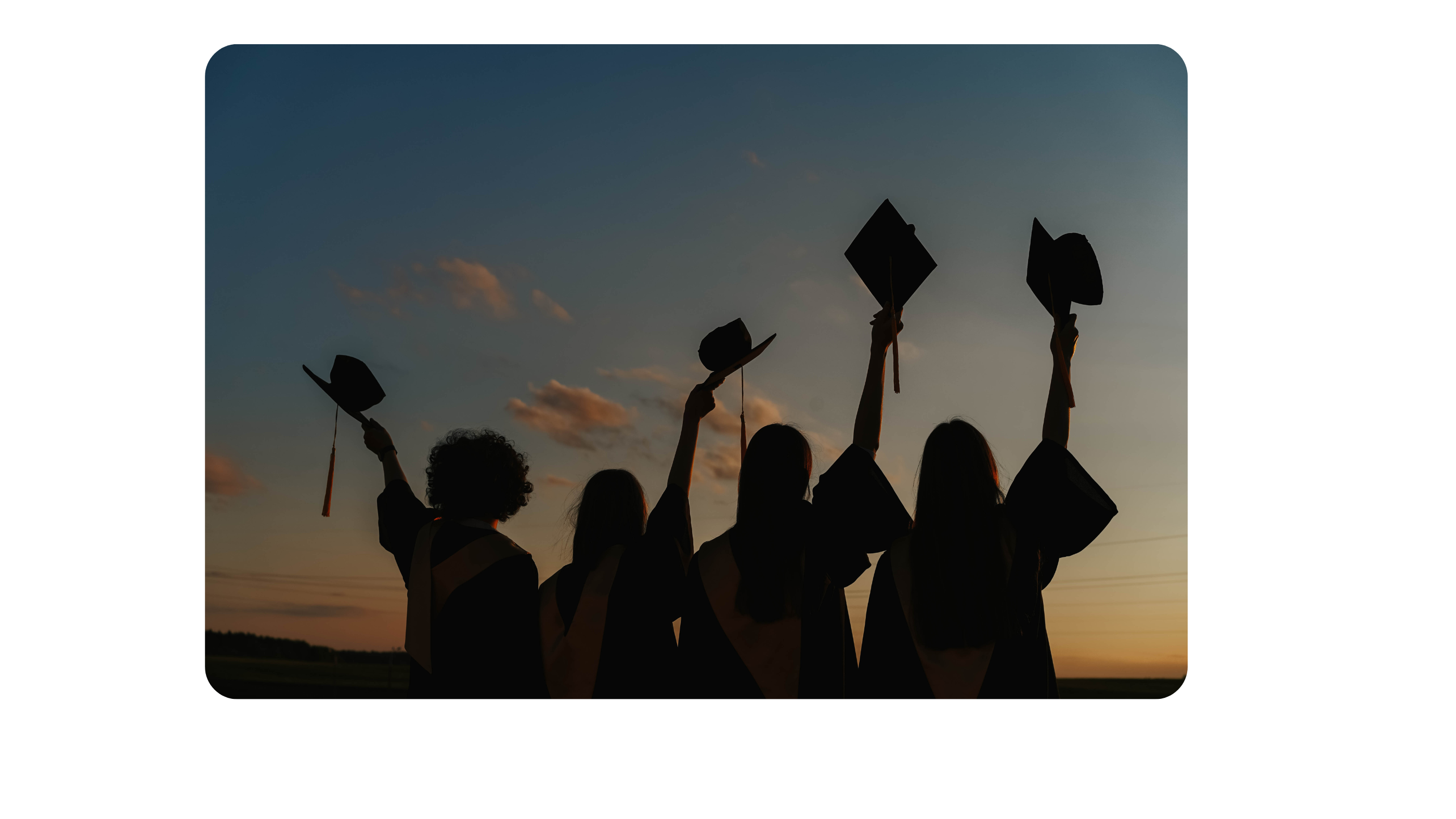 Graduation caps in the air symbolizing Bursary Management outcomes.